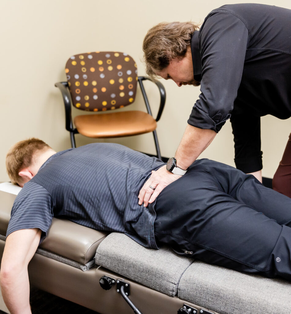 A man receives help from one of our Chiropractors near Lakeville, MN